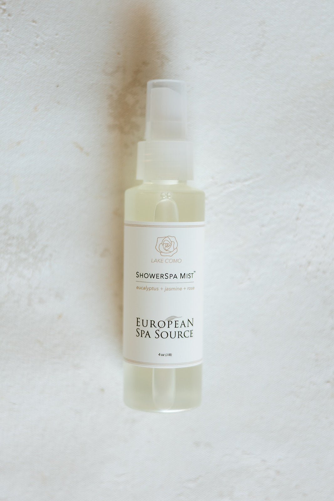 A ShowerSpa Mist⢠bottle featuring eucalyptus shower mist spray